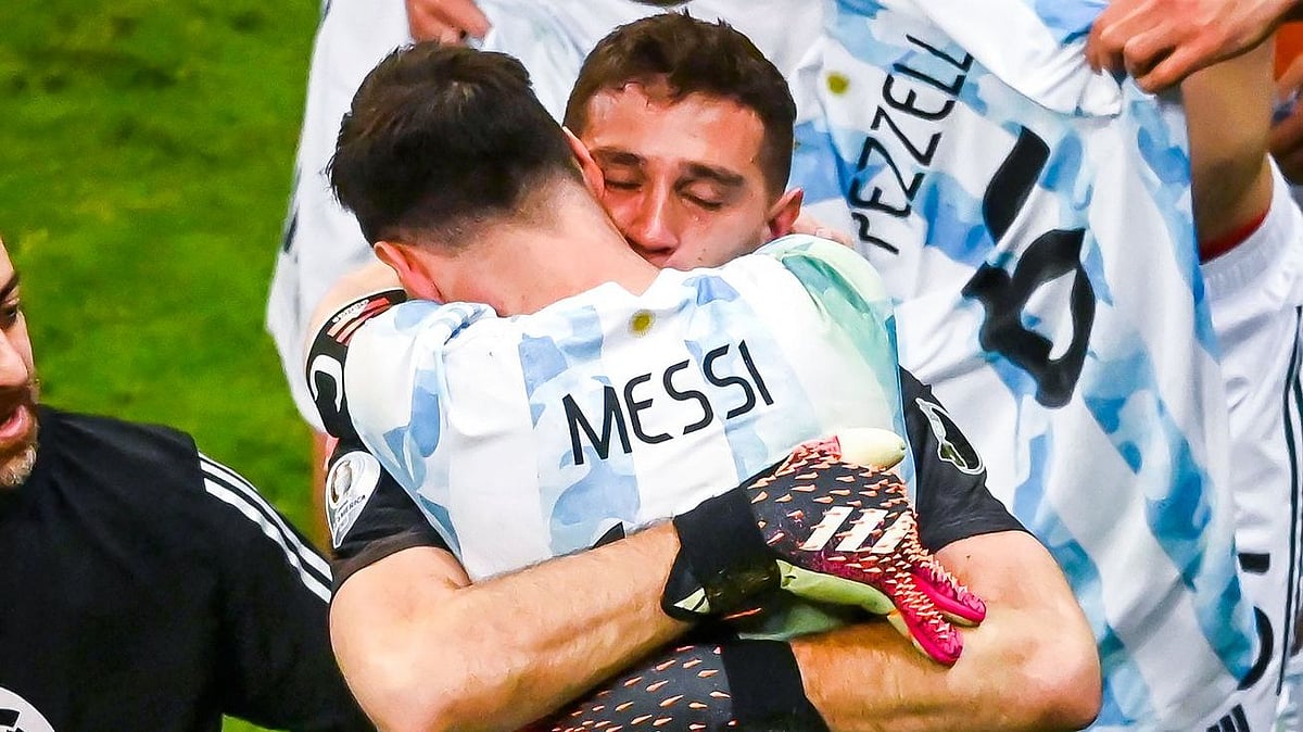 <div class="paragraphs"><p>Messi hugs goalkeeper Emiliano Martinez who saved three spot-kicks in the semi-final. </p></div>
