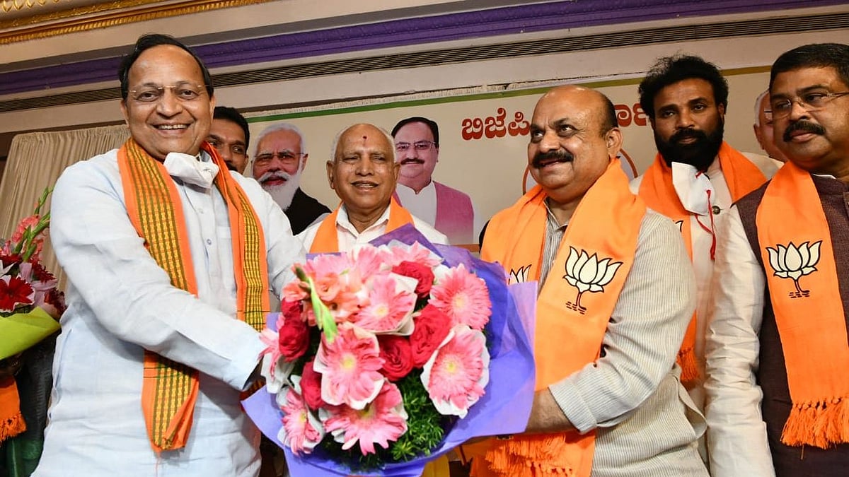 <div class="paragraphs"><p>Basavaraj Bommai with Yediyurappa and Arun Singh</p></div>