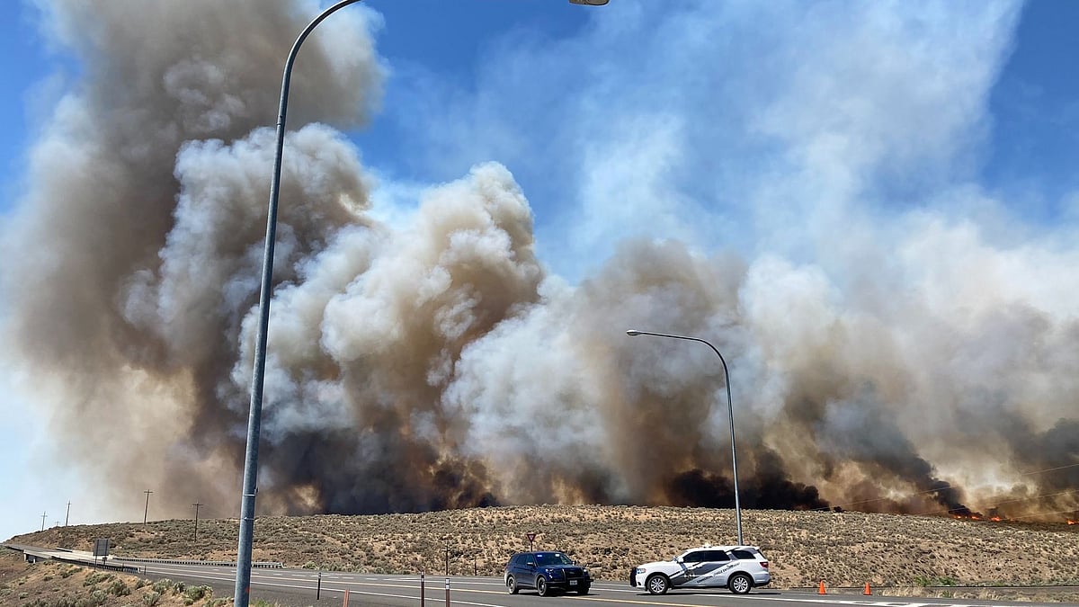 <div class="paragraphs"><p>A road closed near town of Lind for fast moving brush fire.</p></div>