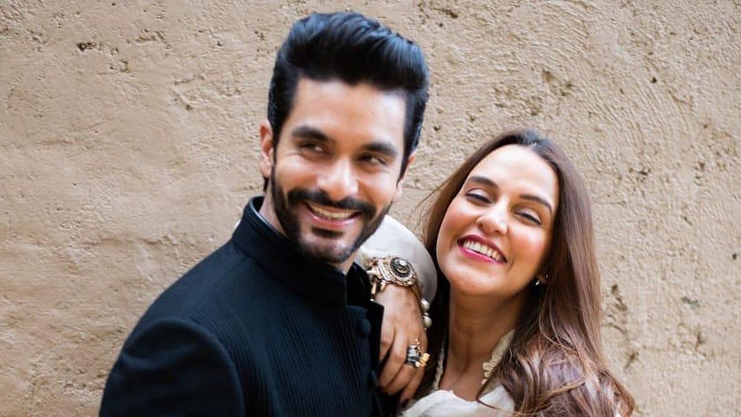 <div class="paragraphs"><p>Neha Dhupia with husband Angad Bedi</p></div>