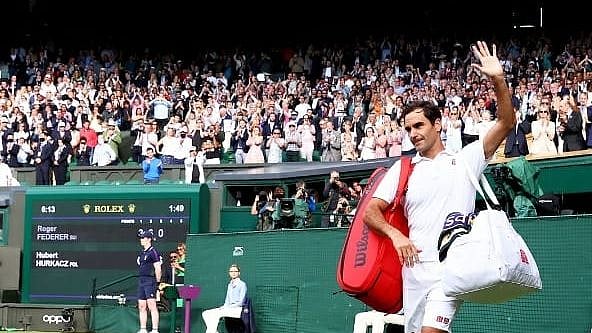 <div class="paragraphs"><p>Roger Federer leaves Centre Court at Wimbledon after losing.&nbsp;</p></div>