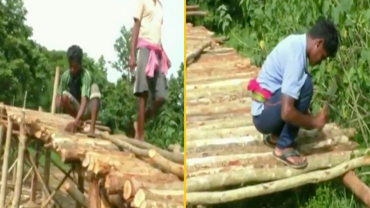 <div class="paragraphs"><p>Villagers from Odisha building a wooden bridge.</p></div>