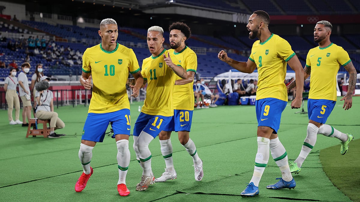 <div class="paragraphs"><p>Tokyo Olympics: Richarlison celebrates scoring a hat-trick against Germany</p></div>