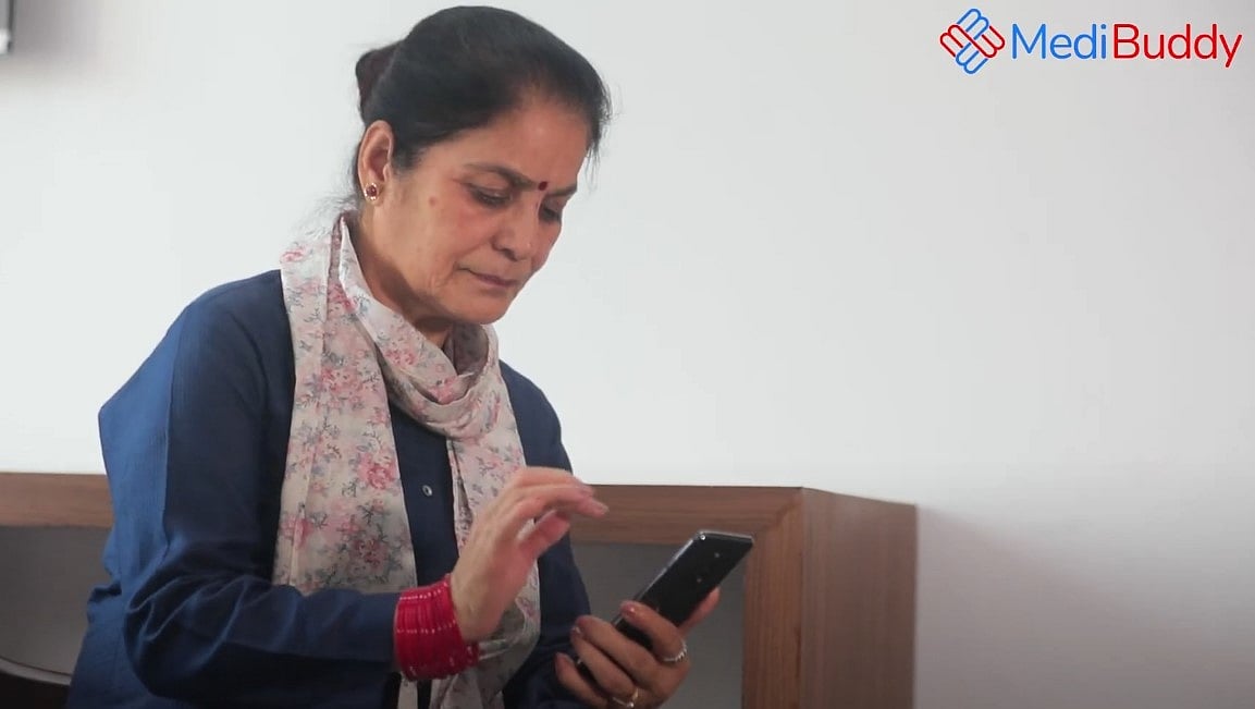 <div class="paragraphs"><p>Vani's mother using MediBuddy App for a tele-consultation. </p></div>