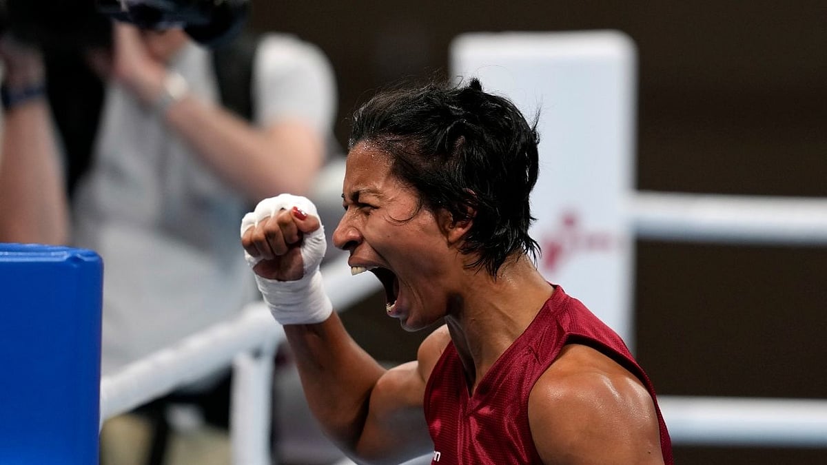 <div class="paragraphs"><p>Lovlina Borgohain celebrates in Tokyo.&nbsp;</p></div>