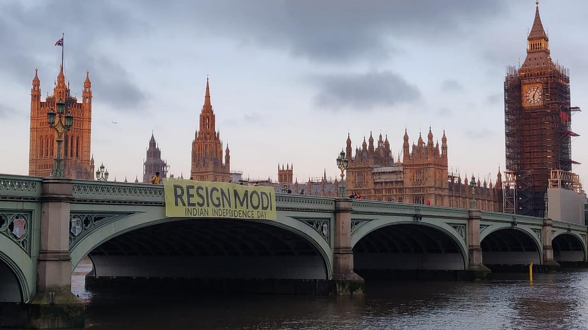 <div class="paragraphs"><p>Members of SouthAsia Solidarity dropped a huge banner reading ‘Resign Modi' from London’s iconic Westminster Bridge.</p></div>