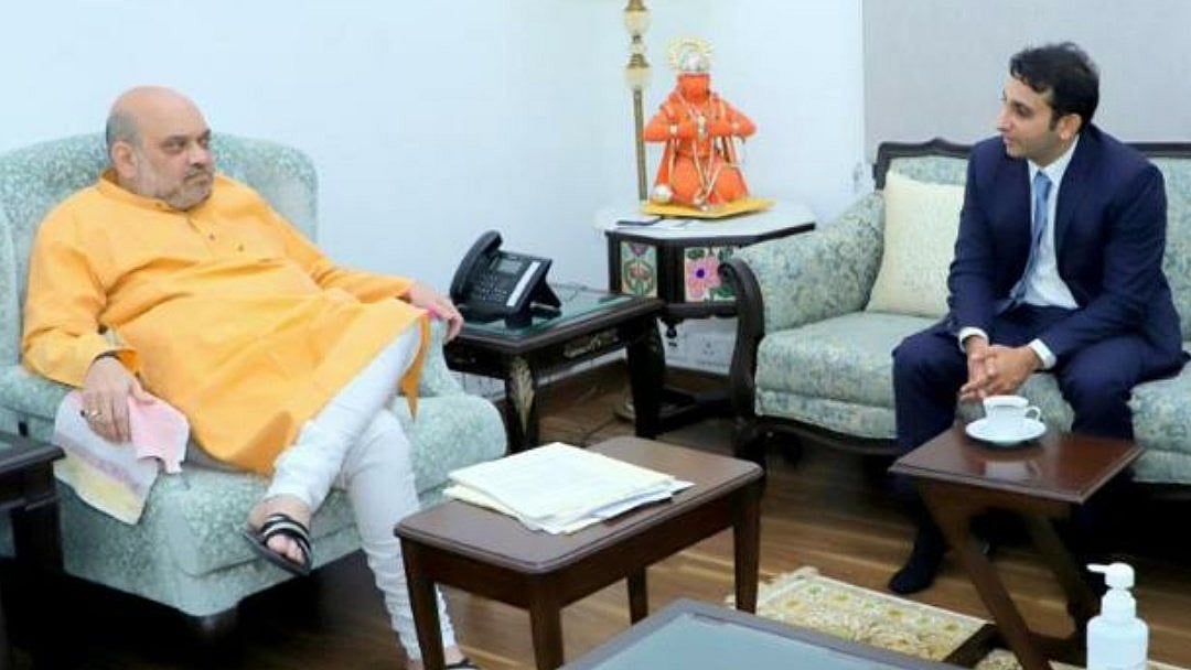 <div class="paragraphs"><p>File photo of Home Minister Amit Shah with SII CEO Adar Poonawalla.</p></div>