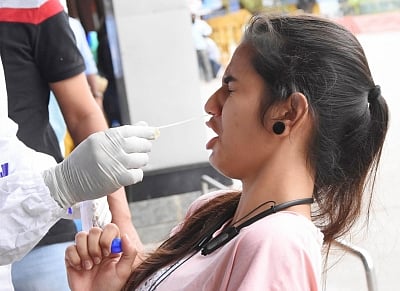<div class="paragraphs"><p>Representative image of a health worker collecting swab samples for COVID-19 tests at City Railway station, Majestic, amid surge in coronavirus cases, in Bengaluru. </p></div>