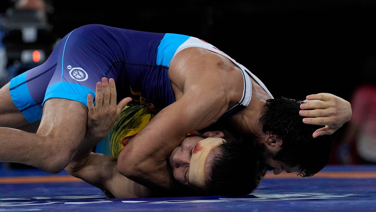 <div class="paragraphs"><p>Ravi Kumar Dahiya (in blue) was bitten by his opponent in his match on Wednesday.&nbsp;</p></div>