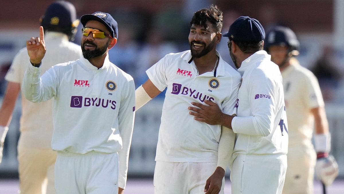 <div class="paragraphs"><p>Indian players celebrate after taking an England wicket.</p></div>