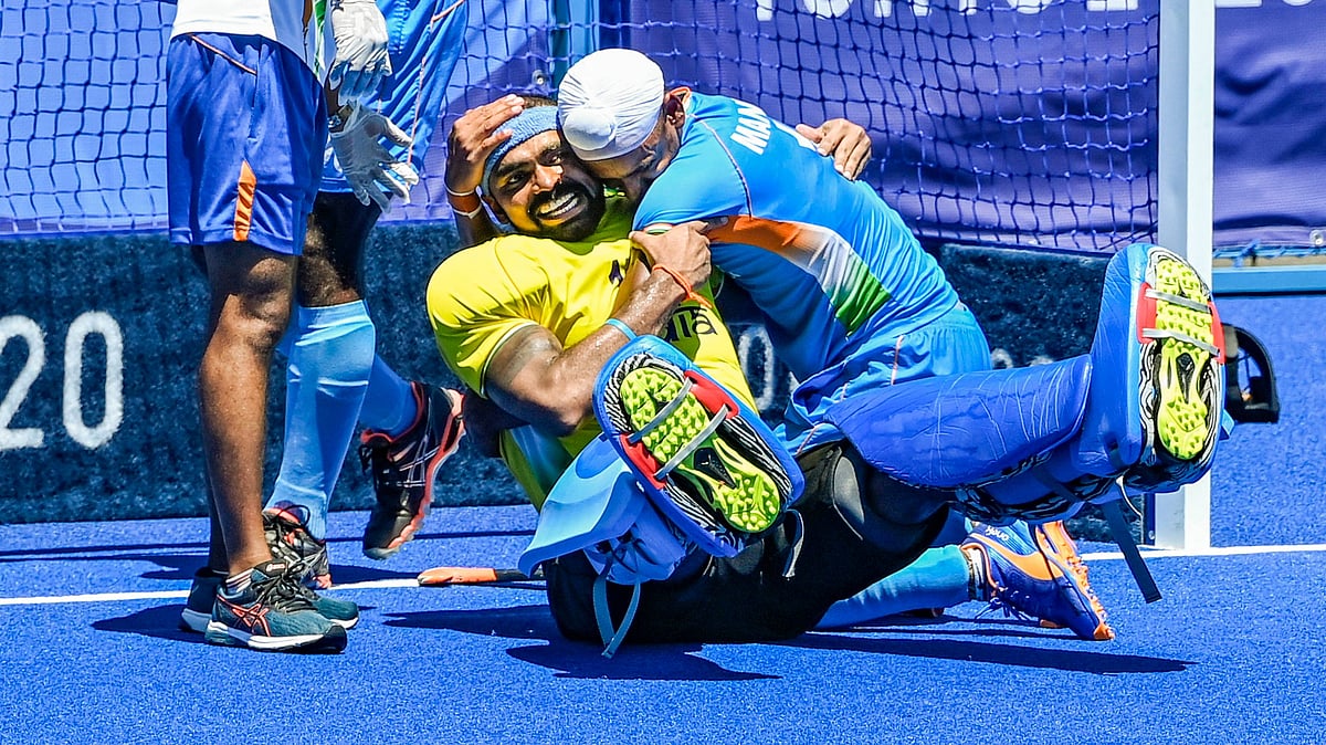 <div class="paragraphs"><p>National Hero: PR Sreejesh celebrates with Mandeep Singh after India beat Germany 5-4 to win the Bronze medal after 49 years. </p></div>