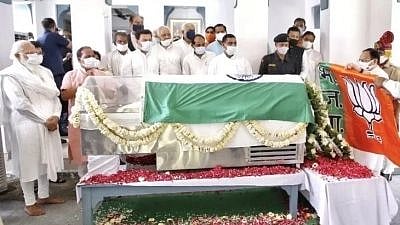 Nadda placing party flag on Kalyan Singh