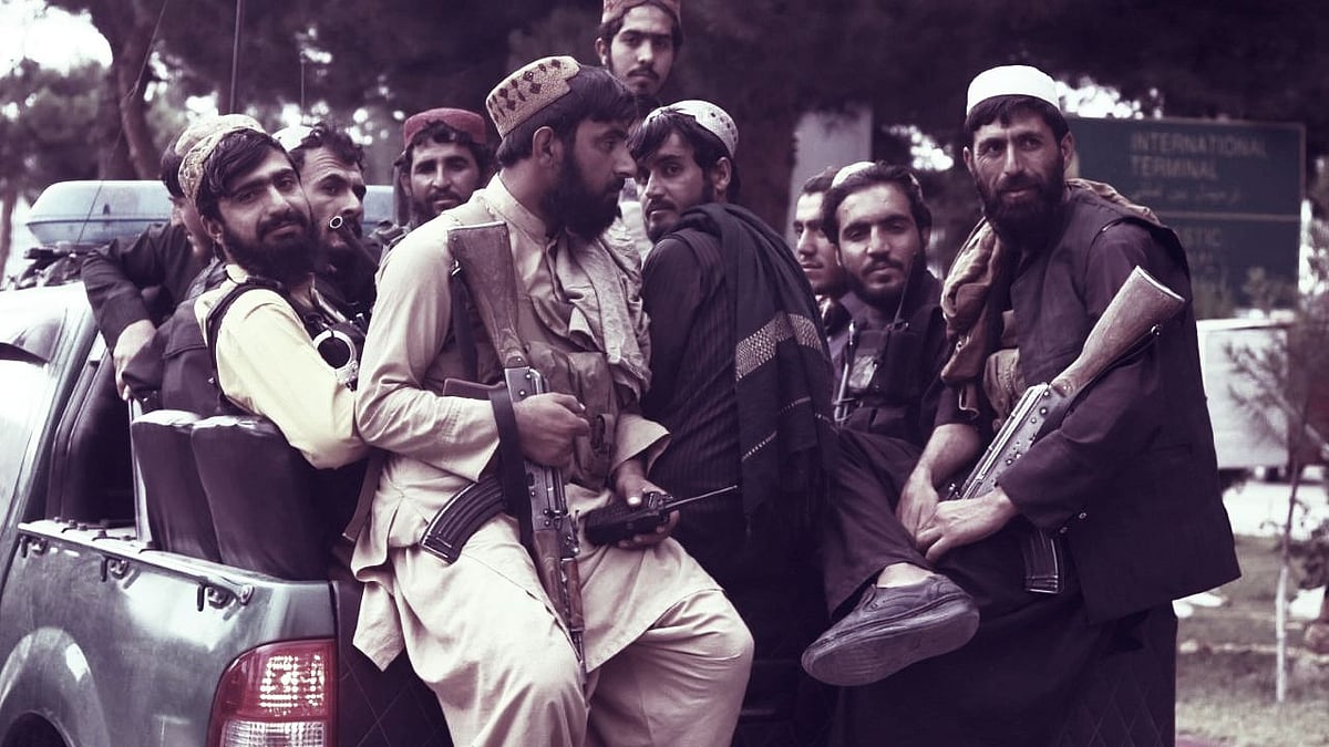 <div class="paragraphs"><p>Taliban fighters at the Hamid Karzai International Airport in Kabul after the US military's withdrawal from Afghanistan, 31 August. Image used for representation purpose.</p></div>