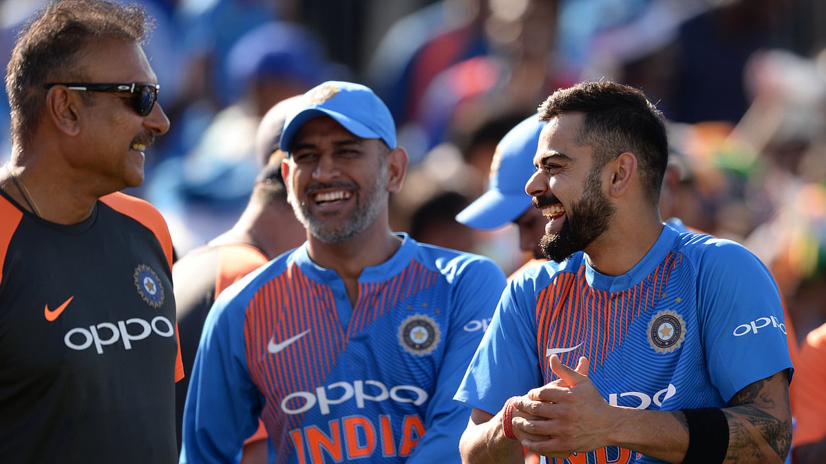 <div class="paragraphs"><p>Ravi Shastri, MS Dhoni and Virat Kohli share a light moment. </p></div>
