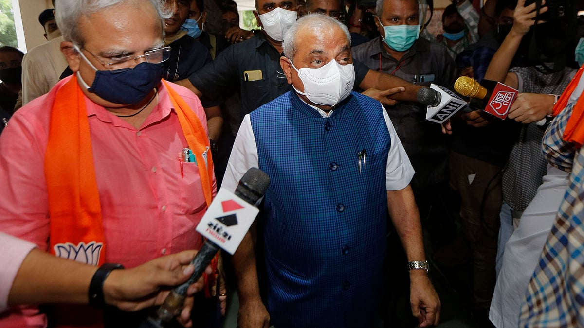 <div class="paragraphs"><p>Gujarat Deputy CM Nitin Patel arrives at the party headquarters for the state BJP legislative party meet to elect the next chief minister at Kamalam in Gandhinagar on Sunday.<br></p></div>
