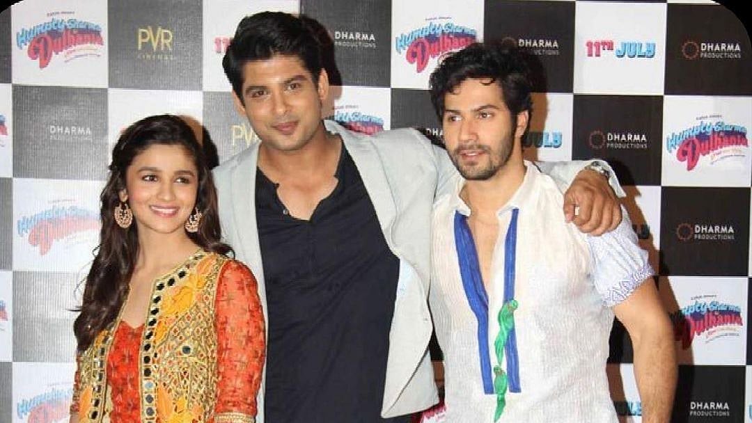<div class="paragraphs"><p>Sidharth Shukla with Varun Dhawan and Alia Bhatt.&nbsp;</p></div>