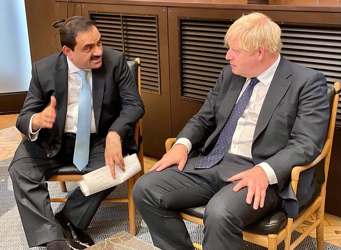 <div class="paragraphs"><p>Gautam Adani with Boris Johnson.</p></div>