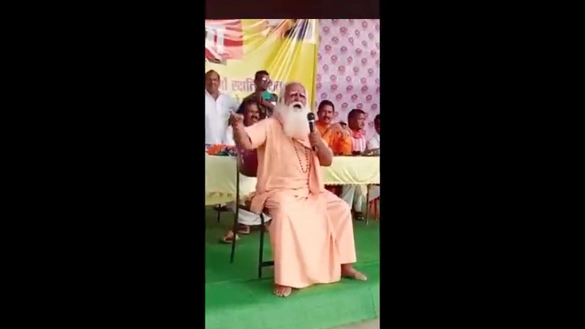 <div class="paragraphs"><p>Swami Parmatmanand inciting the gathering to “behead them, those who come for religious conversion.”</p></div>