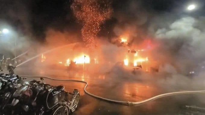 <div class="paragraphs"><p>A residential and commercial building in southern Taiwan was engulfed in fire.</p></div>