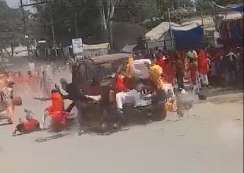 <div class="paragraphs"><p>A speeding car rammed through walking devotees.&nbsp;</p></div>
