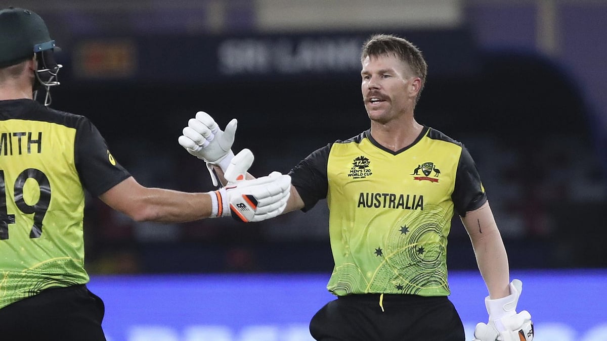 <div class="paragraphs"><p>Australia's David Warner celebrates his fifty with his teammate Steven Smith during the T20 World Cup match against Sri Lanka.</p></div>