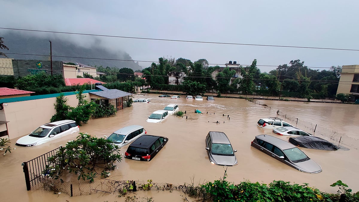 <div class="paragraphs"><p>Submerged cars are seen at a flooded hotel resort in Uttarakhand's Jim Corbett.</p></div>