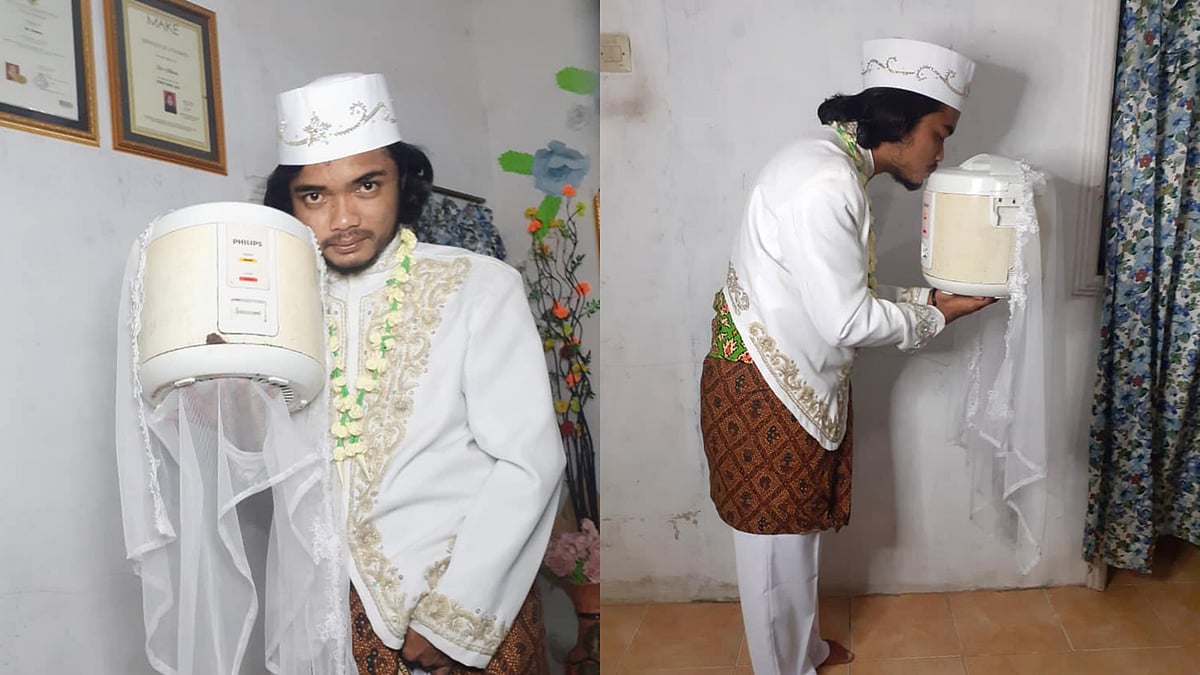 <div class="paragraphs"><p>Khoirul Anam, Indonesian creator, posing with his rice cooker.</p></div>