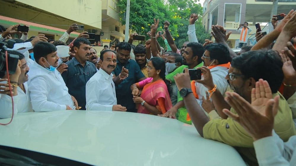 <div class="paragraphs"><p>Eatala Rajender celebrates his win at the BJP party office.</p></div>