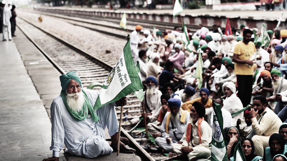 <div class="paragraphs"><p>Farmers block railway tracks as part of the Samyukt Kisan Morchas Rail Roko protest after the violence in Lakhimpur Kheri in October.&nbsp;</p></div>