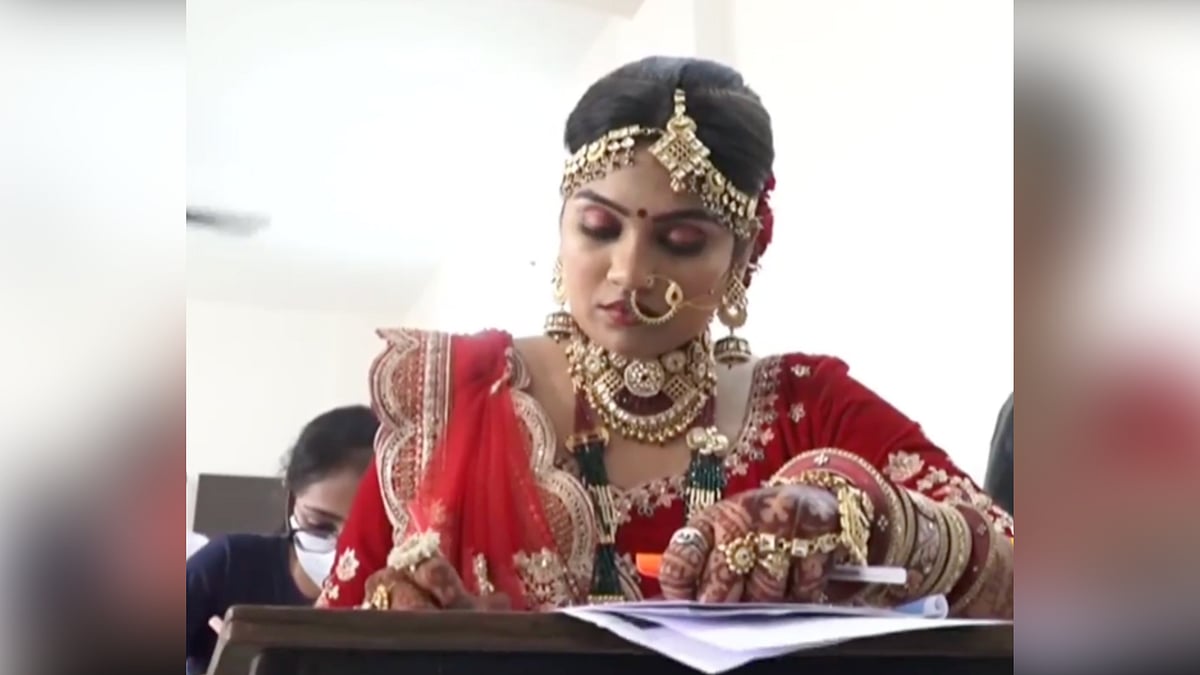 <div class="paragraphs"><p>Bride appears for exam before getting married.</p></div>