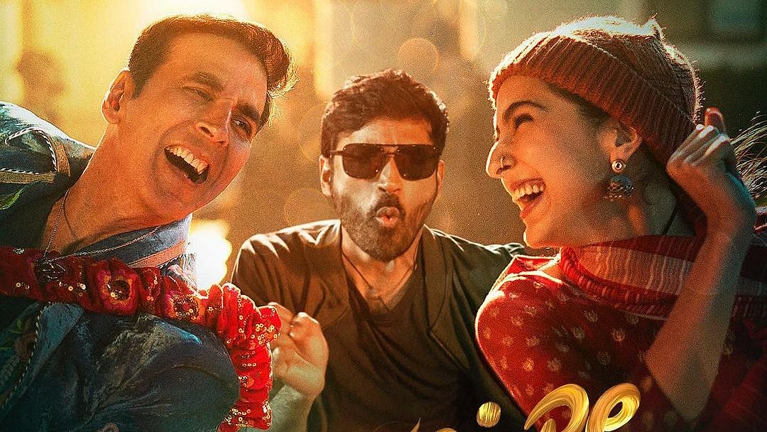<div class="paragraphs"><p>Sara Ali Khan, Dhanush &amp; Akshay Kumar in <em>Atrangi Re</em> poster.</p></div>