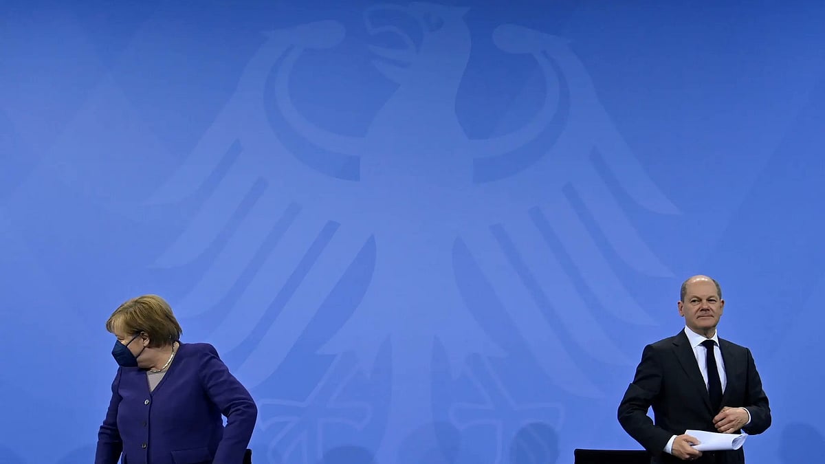<div class="paragraphs"><p>Outgoing German Chancellor Angela Merkel and her successor Olaf Scholz.&nbsp;</p></div>