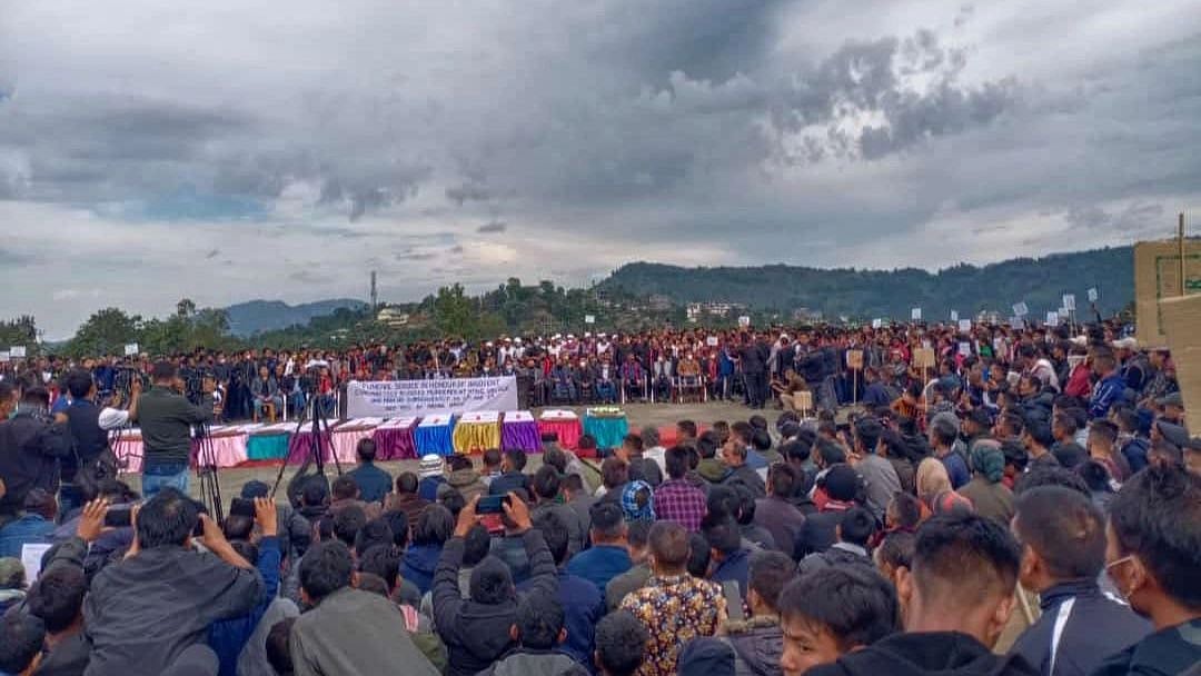 <div class="paragraphs"><p>Funeral service of the 13 deceased villagers in Nagaland.</p></div>