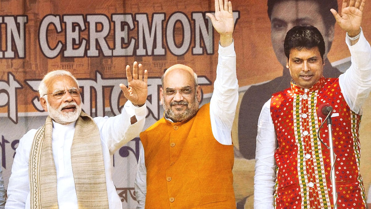 <div class="paragraphs"><p>Tripura CM Biplab Deb, right, with PM Narendra Modi and Union Home Minister Amit Shah. </p></div>