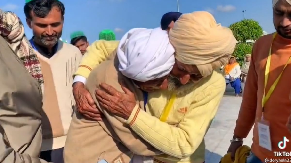 <div class="paragraphs"><p>Two brothers embracing after meeting for the first time </p></div>