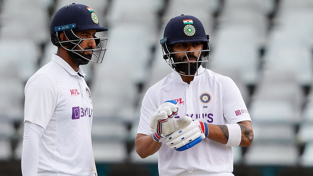 <div class="paragraphs"><p>Virat Kohli and Cheteshwar Pujara during their stand</p></div>