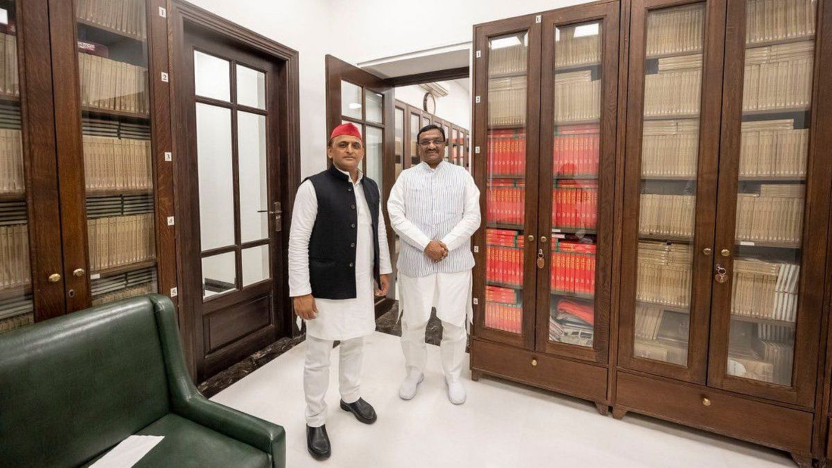 <div class="paragraphs"><p>Akhilesh Yadav with Dharam Singh Saini.</p></div>