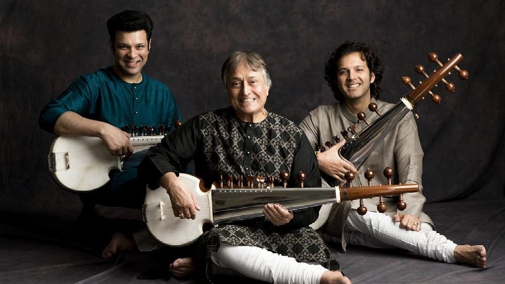 <div class="paragraphs"><p>Ustad Amjad Ali Khan with his sons&nbsp;Amaan Ali Bangash and Ayaan Ali Bangash.</p></div>