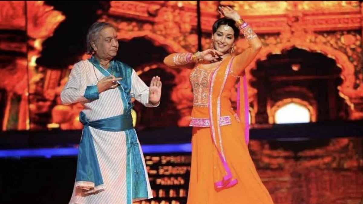 <div class="paragraphs"><p>Madhuri Dixit with Pandit Birju Maharaj.</p></div>