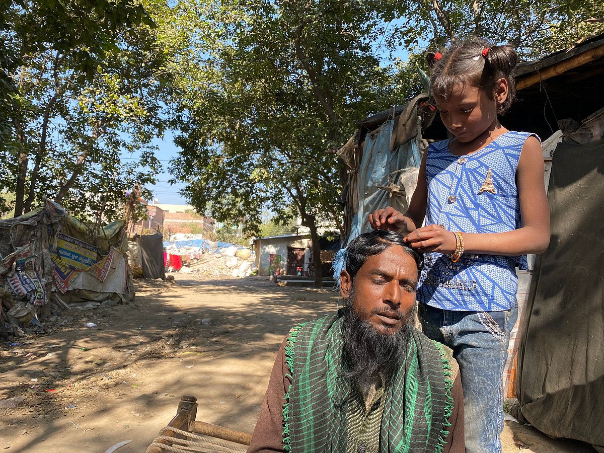 <div class="paragraphs"><p>Afsar Ahmad and his daughter Rojina Ahmad. </p></div>