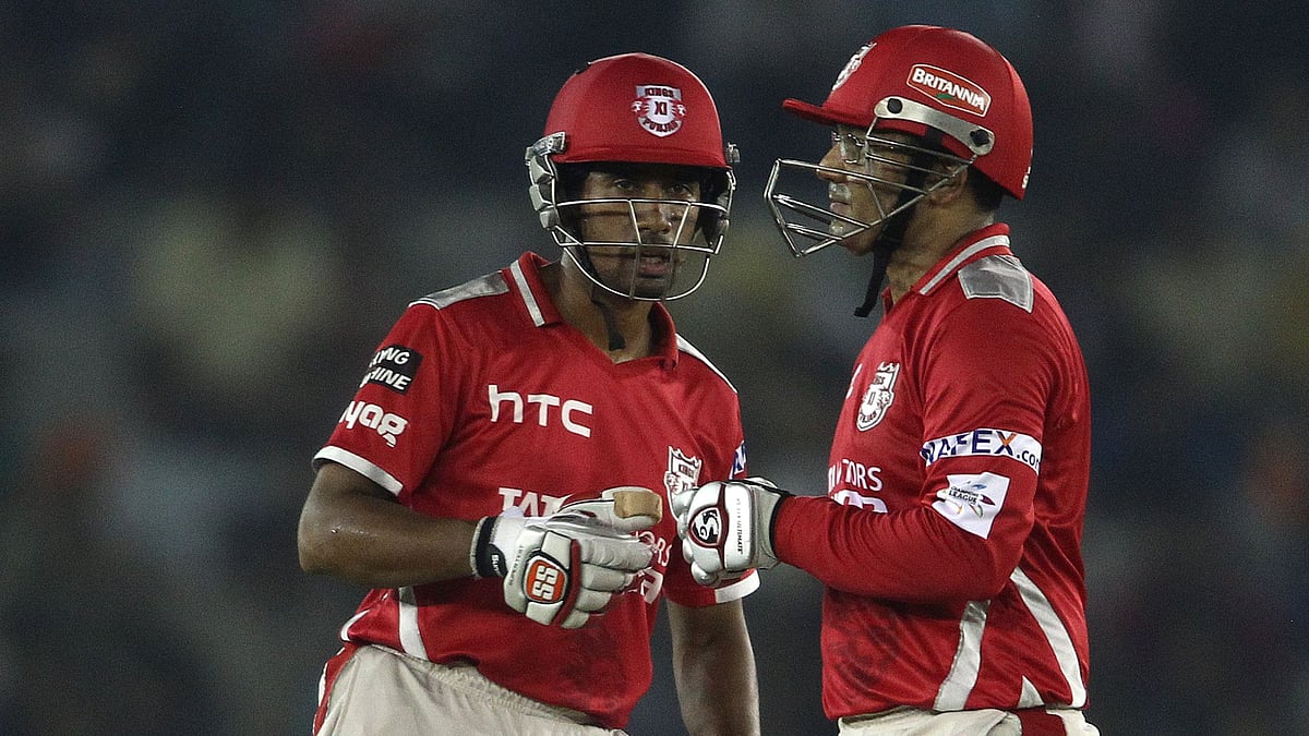 <div class="paragraphs"><p>Wriddhiman Saha and Virender Sehwag playing for Kings XI Punjab</p></div>