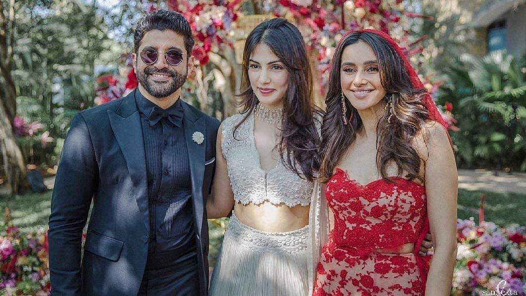 <div class="paragraphs"><p>Rhea Chakraborty shares photos from Farhan Akhtar and Shibani Dandekar's wedding.</p></div>