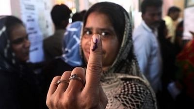 <div class="paragraphs"><p>A voter shows her inked finger after casting her vote. Photo used for representational purposes.</p></div>