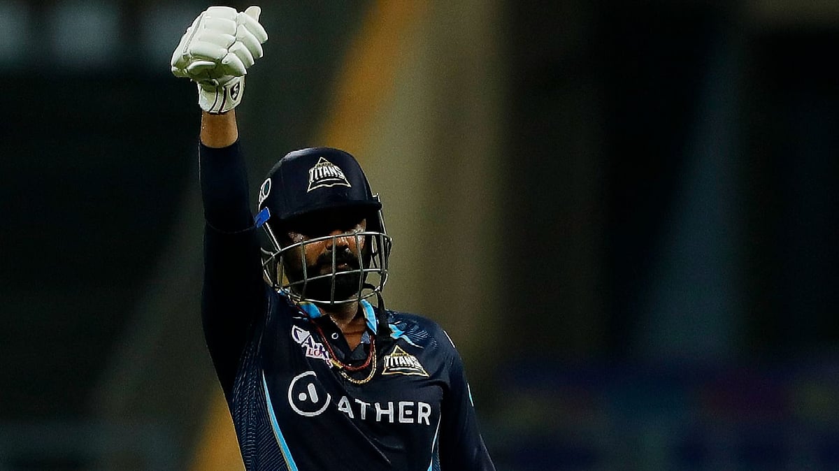 <div class="paragraphs"><p>IPL 2022: Rahul Tewatia of Gujarat Titans celebrating the team's win over Lucknow Super Giants.</p></div>