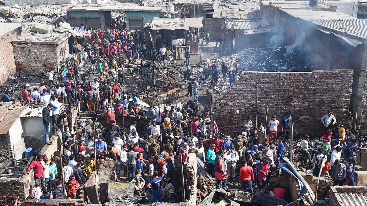 <div class="paragraphs"><p>According to Delhi Police, at least 60 shanties burned down. Image from the spot.</p></div>