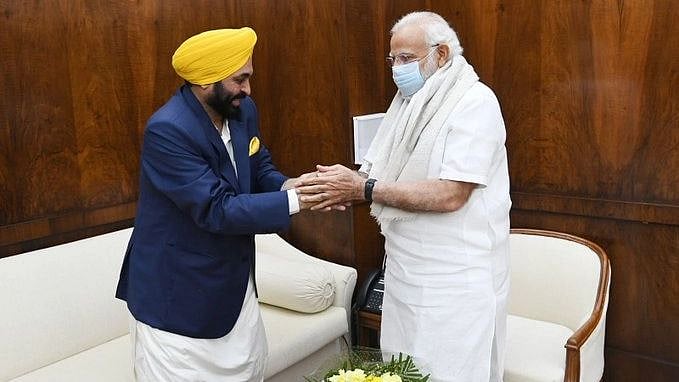 <div class="paragraphs"><p>Punjab Chief Minister Bhagwant Mann with Prime Minister Narendra Modi</p></div>