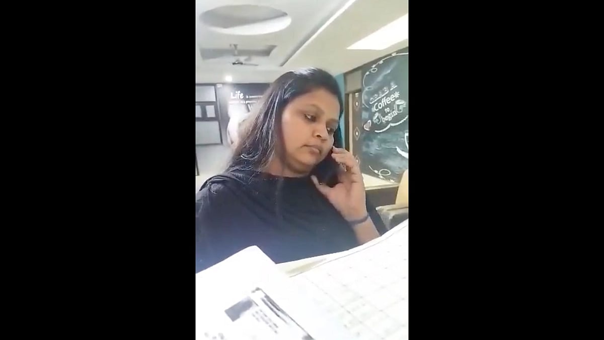 <div class="paragraphs"><p>In the viral video, the man can be seen providing his Aadhaar card to the hotel reception and even offers his passport.</p></div>