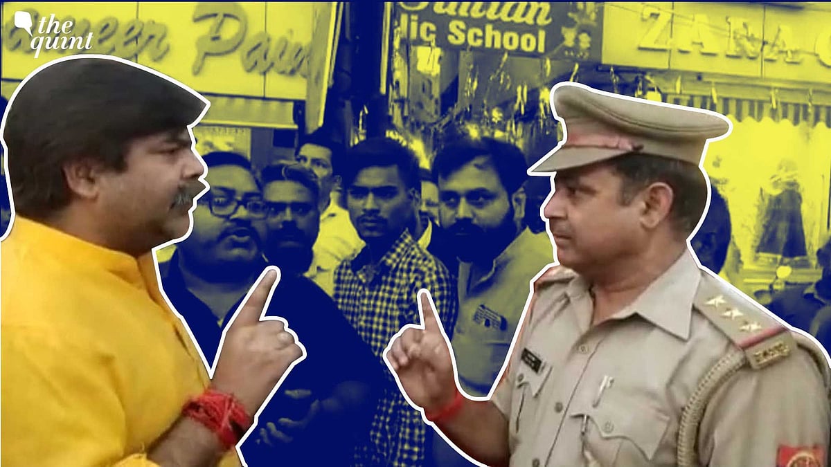 <div class="paragraphs"><p>BJP MLA candidate Kamal Dutt Sharma having a verbal duel with the Meerut SHO.</p></div>