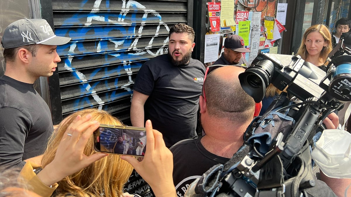 <div class="paragraphs"><p>Social media is erupting in praise for Zack Dahnan (in a black T-shirt).</p></div>