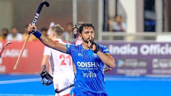 <div class="paragraphs"><p>Harmanpreet Singh celebrates a goal.</p></div>